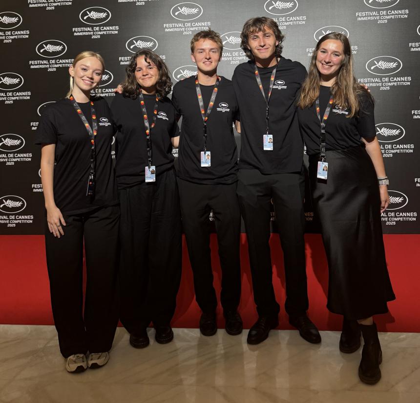 Five Cannes interns dressed in black